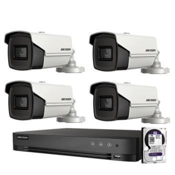 4 كاميرات مراقبة هيكفجن بدقة 8 ميغا وجهاز تسجيل وهاردسك 1 تيرابيت ومحولات وأسلاك توصيلات